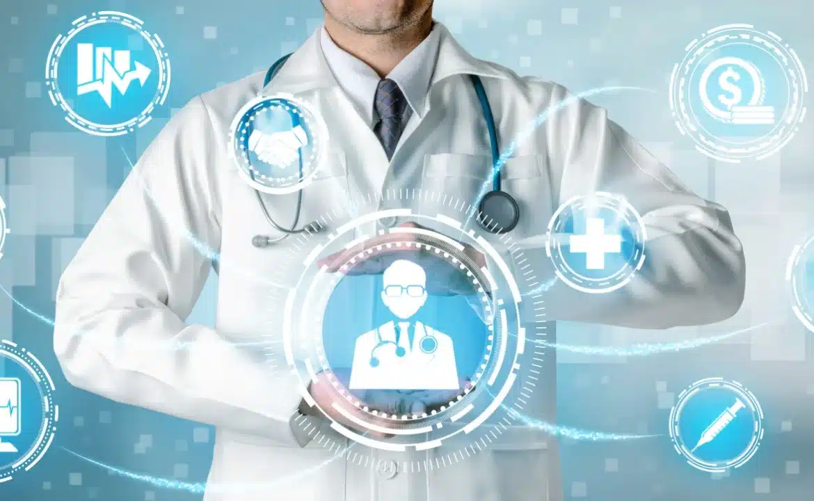 A doctor holds a device displaying icons, symbolizing the cost of implementing AI in healthcare.